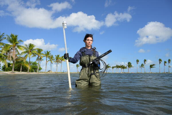 Photo by Jason Gulley/Wildpath. Miami Waterkeeper Rachel Silverstein, PhD, poses with water testing equipment in the public swimming area at Matheson Hammock Park in Miami, Fla. The Miami Waterkeepers sample the park weekly.