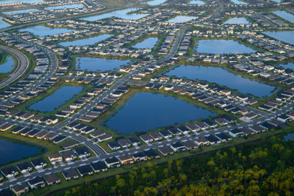 Photo by Jason Gulley/Wildpath. Interconnected networks of  smart ponds store stormwater runoff and reduce flood risks in the Babcock Ranch development in Charlotte County, Fla. Water stored in ponds is eventually routed through wetlands for additional treatment to reduce nutrient pollution before being returned to the environment.